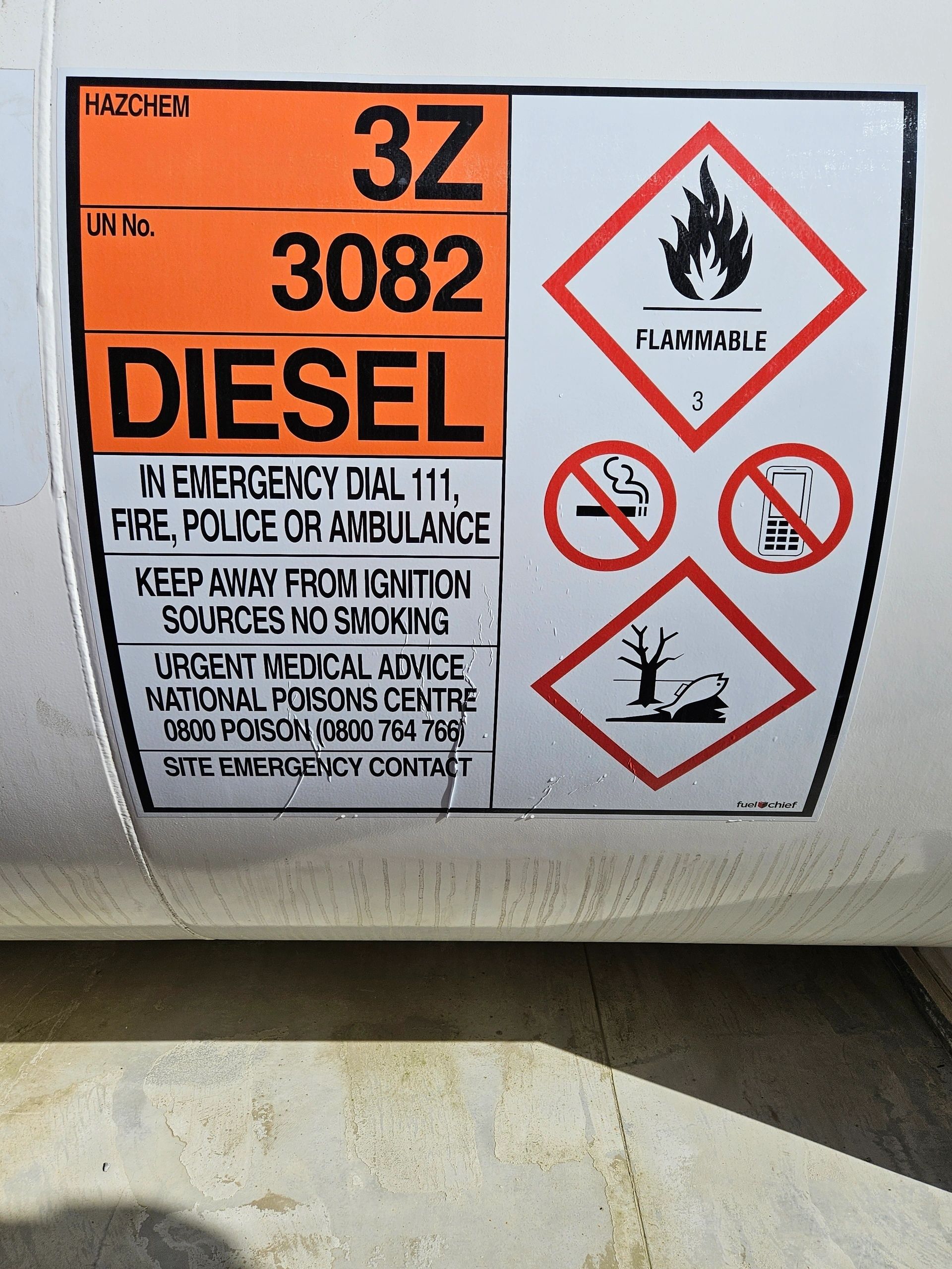 Diesel hazardous substance label on a stationary storage tank